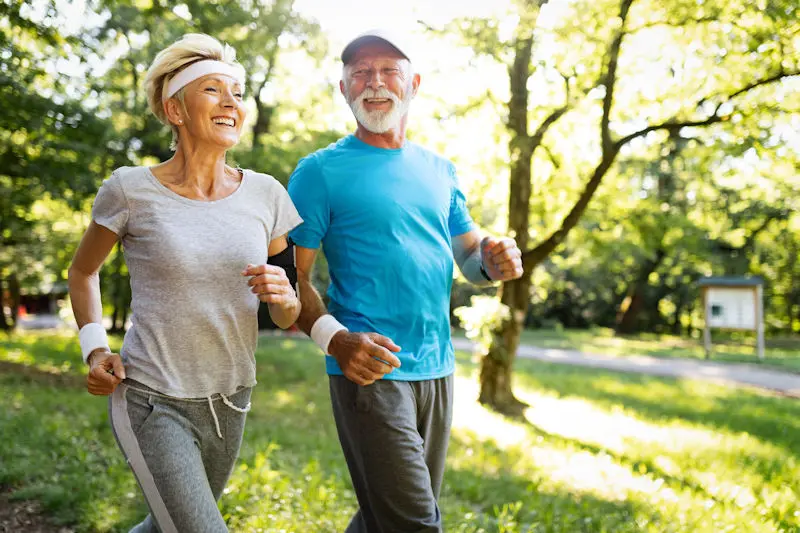 Older couple running